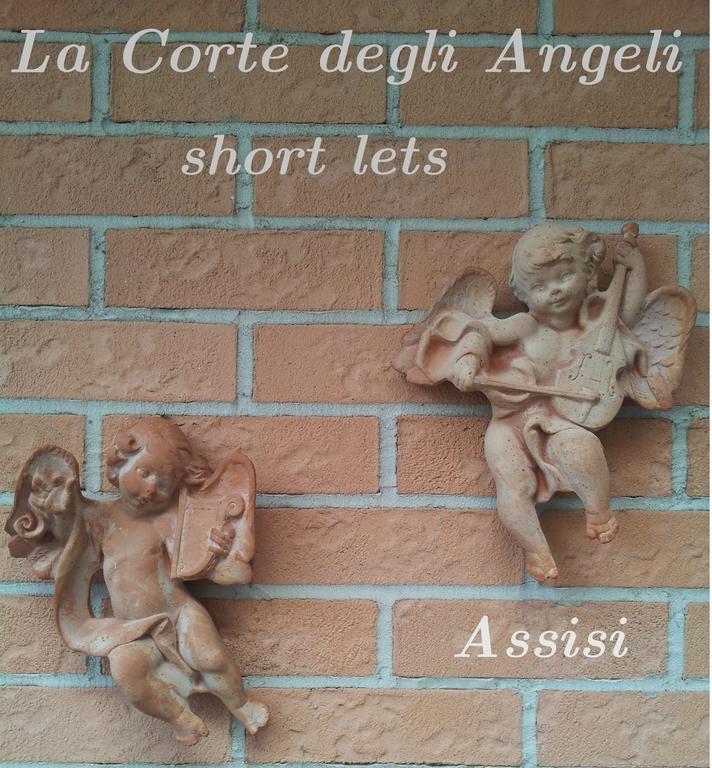 אסיסי La Corte Degli Angeli Locazioni Turistiche חדר תמונה